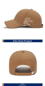 Detail view of khaki cotton baseball cap showing side embroidery and metal back buckle