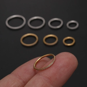 316L stainless steel hoop earrings with cubic zirconia in gold and silver finishes