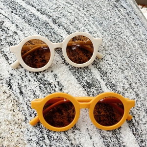 Kids round frame sunglasses in beige and ginger yellow with matte texture finish