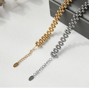 Detail of 18K gold and silver plated beaded bracelets with K18 hallmark tags