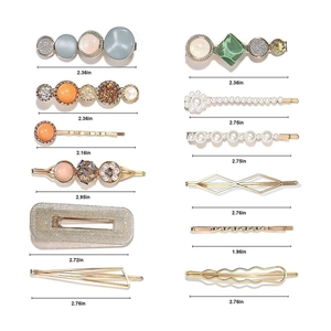 Detailed size guide showing lengths of various pearl and marble hair clips in inches