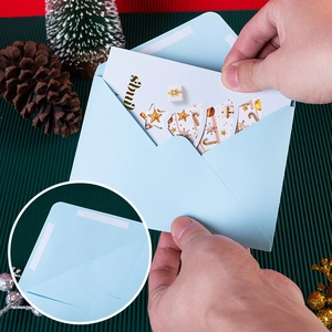 Creative Christmas greeting card set in light blue envelope with self-adhesive seal