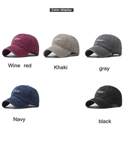 Detailed color display of cotton baseball caps in burgundy, khaki, navy, and black