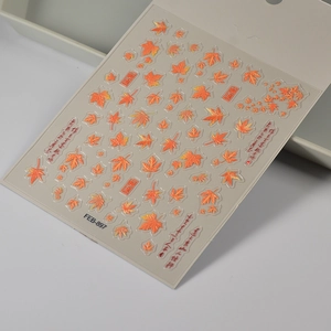 Detailed macro view of FEB-897 autumn maple leaf 3D nail art stickers with calligraphy