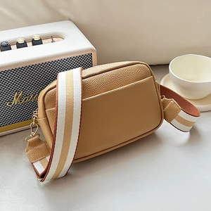 Khaki crossbody camera bag with lychee texture leather and striped wide shoulder strap