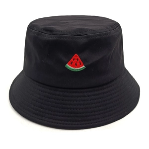 Detailed close-up of watermelon slice embroidery on a black cotton bucket hat