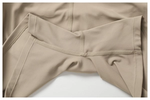 Macro shot of high-stretch fabric with professional flatlock seams on yoga pants