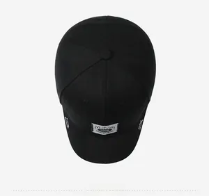 Top view of a black canvas baseball cap featuring a white 1998 GOODVIEW cloth label