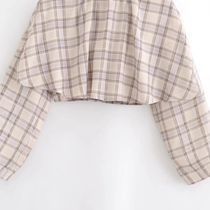Plaid cropped top for women with beige and purple checkers and elastic hem detail