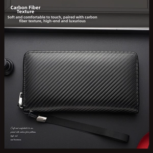 Close-up of a men's long wallet featuring a textured carbon fiber finish and silver zipper