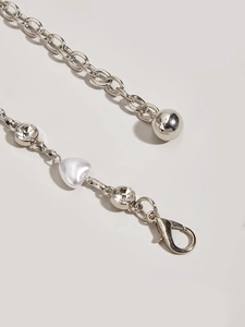 Silver waist chain belt with heart-shaped faux pearl and sparkling rhinestone accents