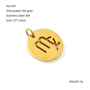 Macro shot of 18k gold plated hollow constellation charm with 12mm diameter dimensions