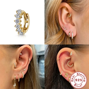 Detailed view of gold S925 sterling silver hoop earrings with clear zircon stones