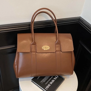 Brown large capacity leather tote bag with gold swivel clasp for office commuting