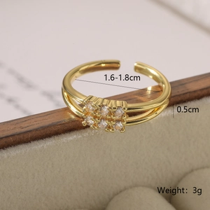 Detail view of 18K gold plated ring with dimensions of 0.5cm width and 1.7cm inner diameter