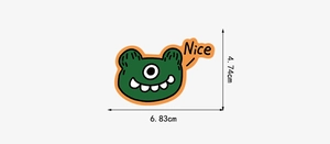 Detailed dimension view of a green cartoon monster sticker showing 6.83cm width and 4.74cm height