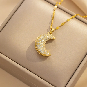 Elegant gold titanium steel necklace featuring a sparkling crescent moon pendant in a gift box