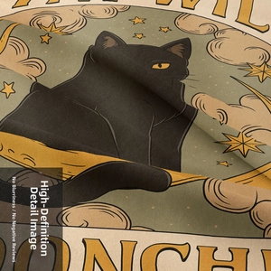 Close-up of the woven fabric texture and sharp printed black cat illustration on tapestry