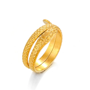 Vintage snake ring in gold-plated stainless steel with detailed scale texture on white background