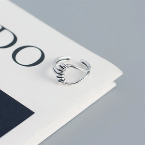 Detailed view of the S925 sterling silver handmade wire-wrapped knot open ring design