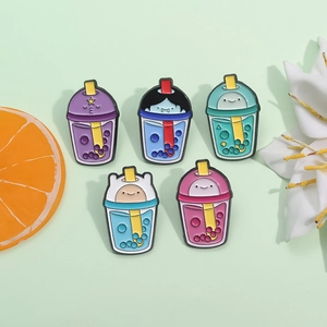 Five-piece Adventure Time inspired enamel pin set featuring cartoon milk tea cup designs
