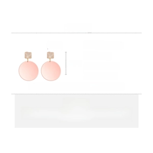 Detail showing dimensions of pink resin round drop earrings with beige square studs