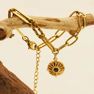 18K gold plated stainless steel paperclip chain bracelet with blue starburst charm