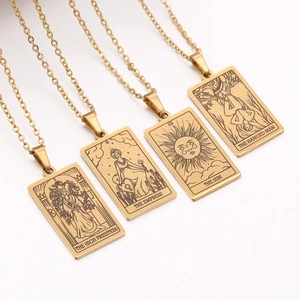 Detailed set of four gold tarot card necklaces featuring Priestess and Sun engravings