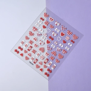 3D embossed heart and bow nail art stickers in red white and blue with model FEB-801