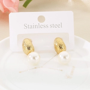 Detailed shot of double-layered frosted shell pearl earrings with gold stainless steel finish