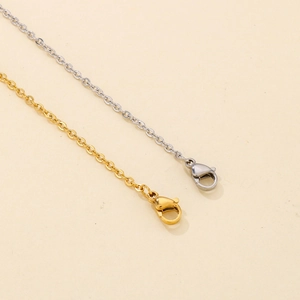 Detail of gold and silver stainless steel necklaces with secure lobster clasps