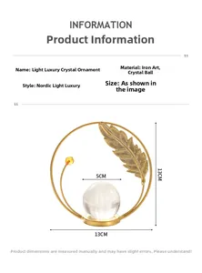 Detail of Nordic gold iron ornament featuring leaf frame and 5cm crystal ball