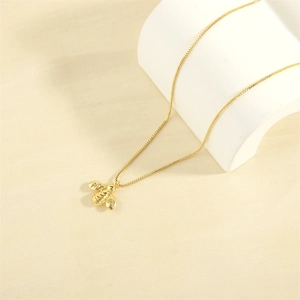 Detailed close-up of 18K gold plated 3D bee pendant necklace with a fine box chain