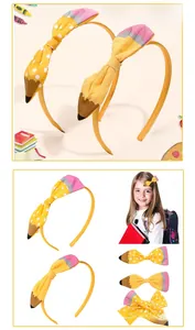Detail of yellow pencil bow headbands and clips set for school girls hair accessories