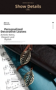 Detail of vintage bronze leaf metal charms with leather cords on retro notebooks