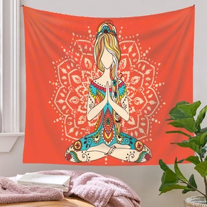 Cozy home setting with a mandala tapestry featuring a yoga meditation lotus pose