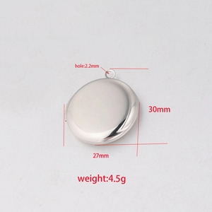Technical drawing showing 30mm x 27mm dimensions of round stainless steel locket pendant