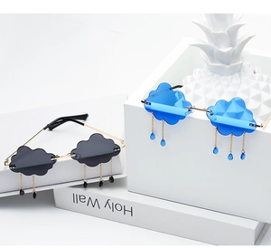 Detail of cloud-shaped rimless sunglasses with hanging raindrops and metallic legs