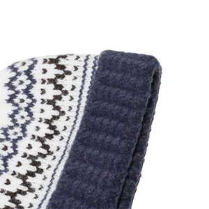 Detailed view of Fair Isle knit beanie with navy geometric patterns and ribbed cuff