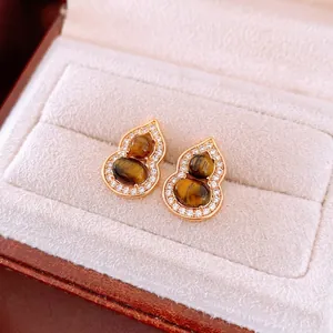 Boucles d'oreilles Wulu en or avec œil de tigre et pavé de zircons cubiques