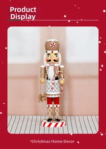 Close-up of wooden gingerbread nutcracker with white icing details and striped base