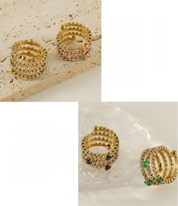 Close-up of multi-layer spiral ring with 18K gold plating and colorful zirconia stones