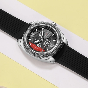 Detail shot of men's sports watch with silver steel case and black silicone strap