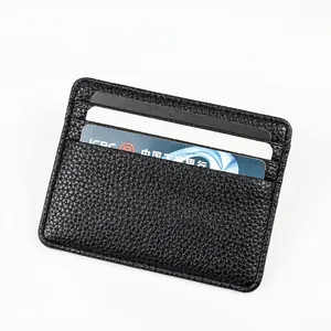 Slim black lychee pattern leather card holder with multiple slots on a white background