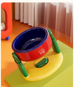 Close-up of colorful tilted pet bowl with anti-slip base for ergonomic cat and dog feeding