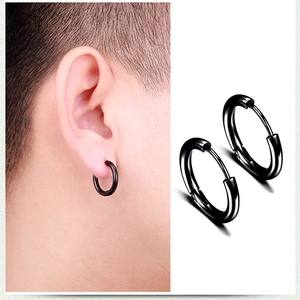 Detail of minimalist black stainless steel hoop earrings for men and women