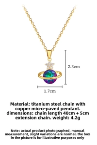 Detailed view of gold-tone star and planet pendant necklace with dimensions 1.7x2.3cm