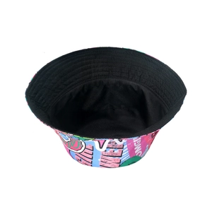 Inside view of graffiti bucket hat showing colorful pop art prints and black lining