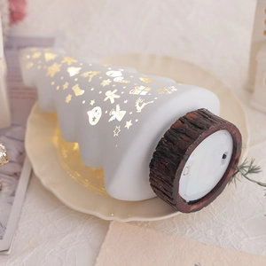 Glow Christmas tree night light with gold foil patterns and wood-like base decor