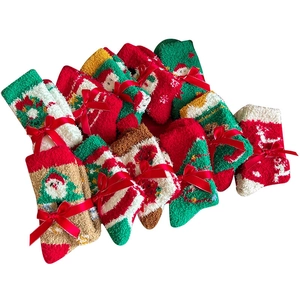 Christmas coral fleece thermal socks set featuring festive holiday patterns and gift ribbons